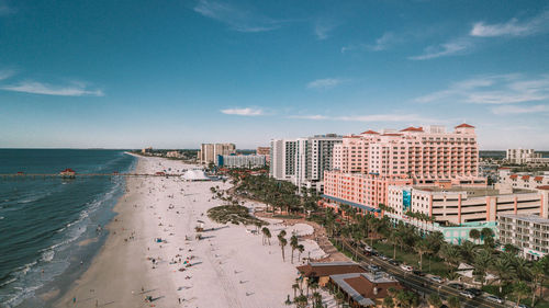 High angle view of beach and buildings against sky