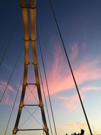 Low angle view of ferris wheel against sky