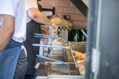 Cooking and frying foods in the restaurant.