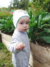 Portrait of cute girl standing outdoors