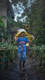 Full length of man working in farm