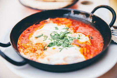 Close-up of shakshouka in pan