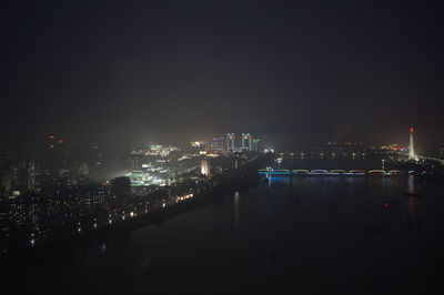 Illuminated cityscape at night