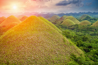 Scenic view of mountains against sky during sunset