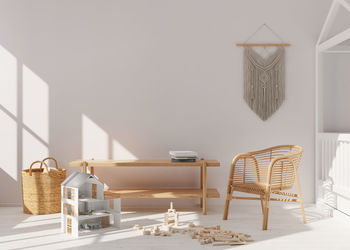 Empty white wall in modern child room. mock up interior in scandinavian, boho style. copy space