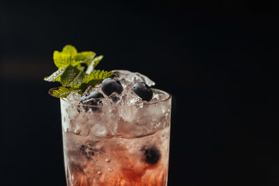 Close-up of drink against black background