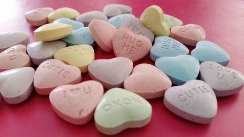 Close-up of candy hearts for valentine day on table