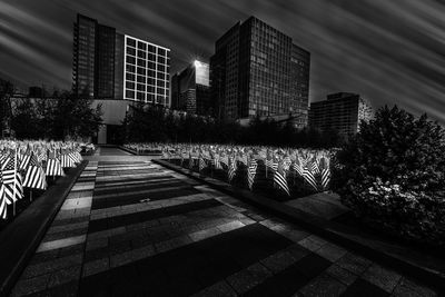 Street amidst buildings against sky