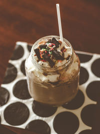 High angle view of ice cream in jar on table