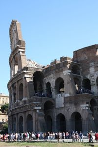 Tourists in front of historical building