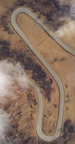 High angle view of road passing through land