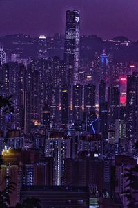 Aerial view of illuminated buildings in city at night