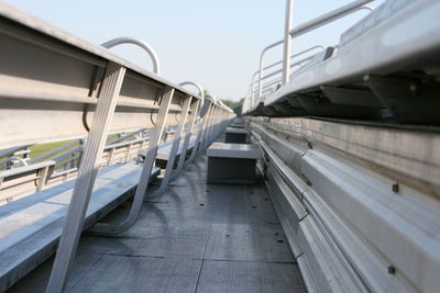 Cars on bridge against sky