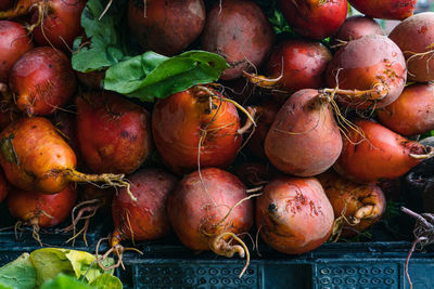 Close-up of root vegetables for sale at market stall