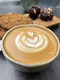Close-up of cappuccino on table