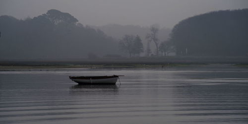 Boat in sea against sky