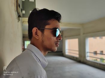 Portrait of young man looking away