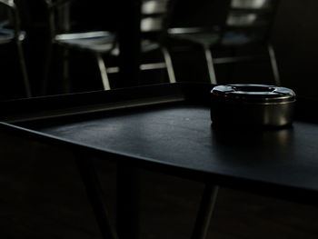 Close-up of chairs and table