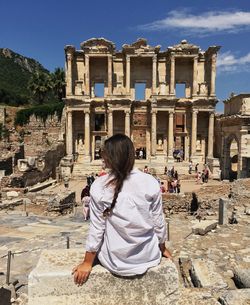 Full length of man on old ruin