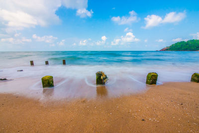 Scenic view of beach against sky