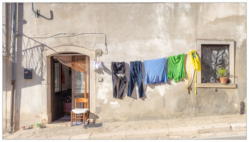 Clothes drying against building