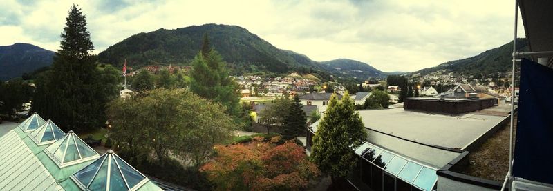 Town against cloudy sky