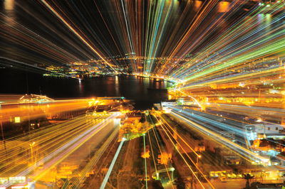 High angle view of light trails on city at night