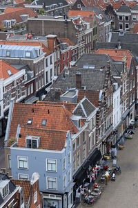 High angle view of street amidst buildings in town