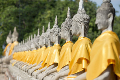 Buddha statues in row at wat yai chai mongkhon