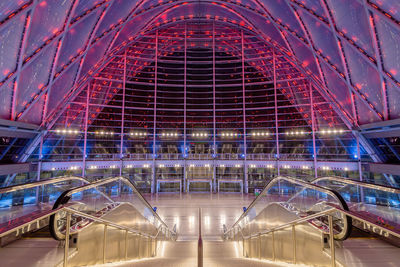 Low angle view of illuminated building at night