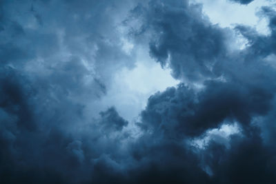 Low angle view of storm clouds