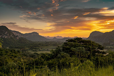 Scenic view of mountains against sky during sunset