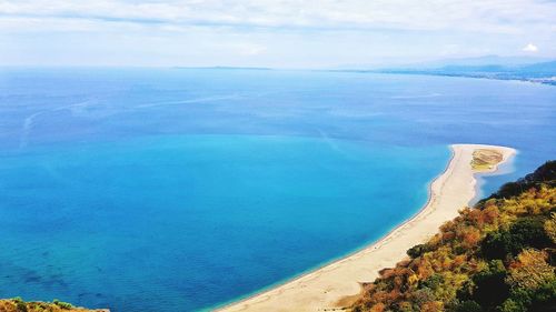 High angle view of beach against cloudy sky