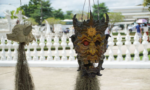 Close-up of statue against plants