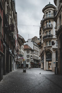 View of buildings in city against sky