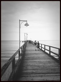 View of pier on sea