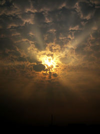 Low angle view of dramatic sky during sunset