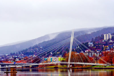 The ypsilon bridge in the city of drammen on a foggy fall afternoon