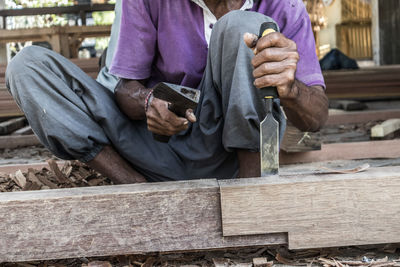 Man working on wood