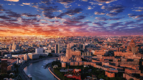 High angle view of buildings against sky during sunset