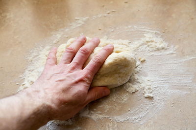 High angle view of hand of a bakera