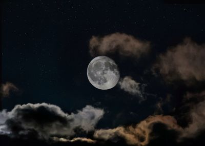 Low angle view of full moon in sky