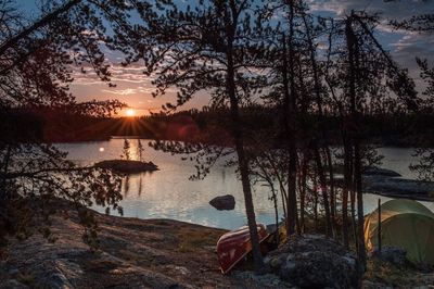 Scenic view of lake against sky during sunset