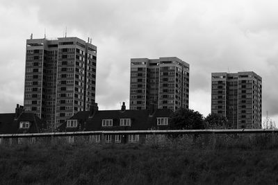 Buildings in city against sky