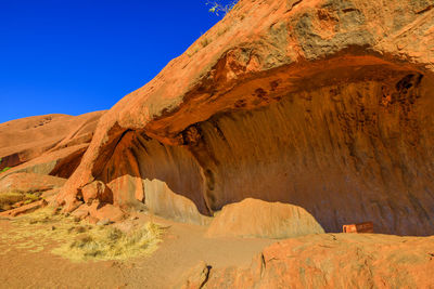 Rock formations in desert against clear sky