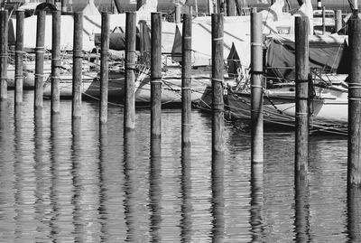 Row of boats moored in sea