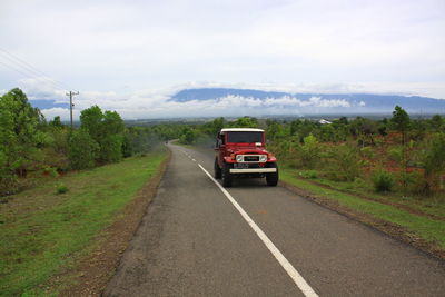 Car on road against sky