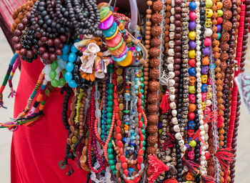 Close-up of colorful religious beads for sale at market