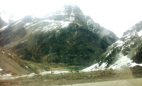 Scenic view of mountains against clear sky