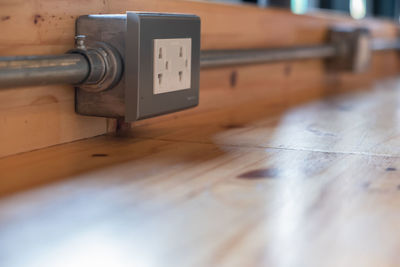 Close-up of camera on table at home